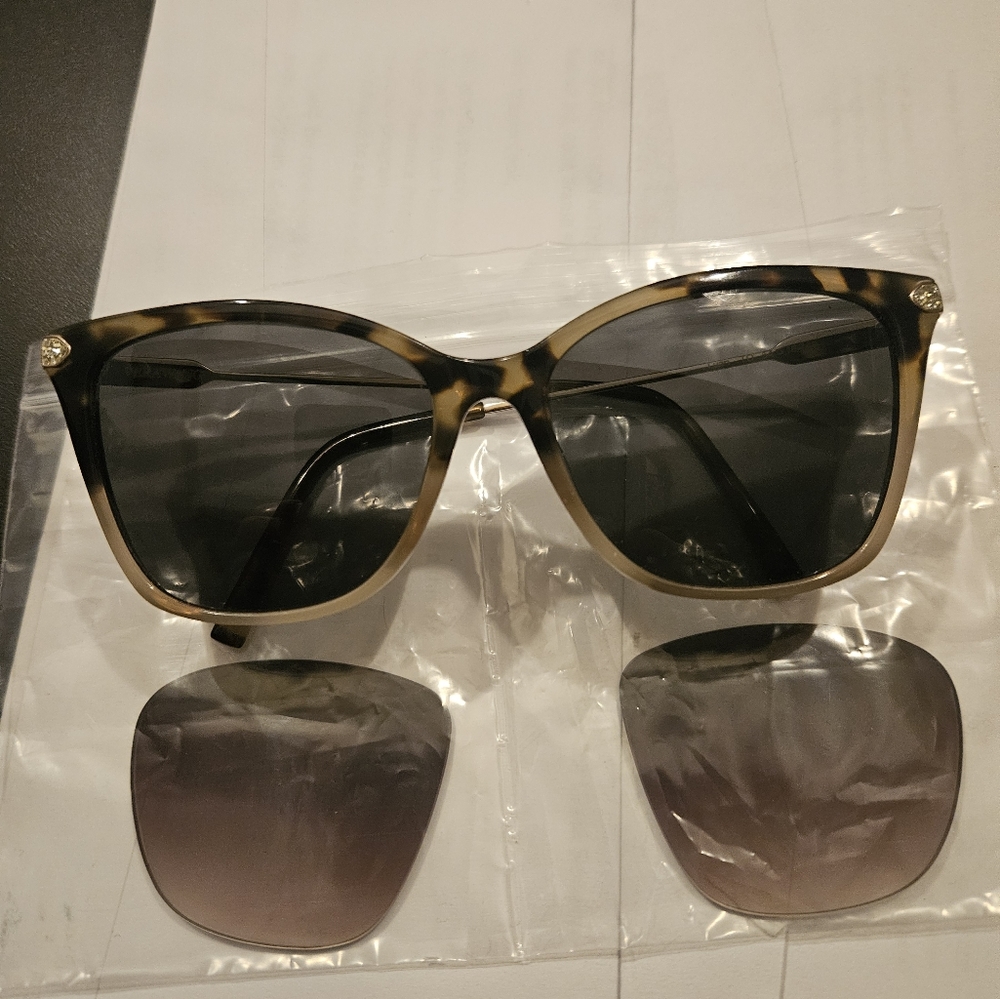 Vera Wang sunglasses with polarized lenses & a set of brown gradiant lenses. New